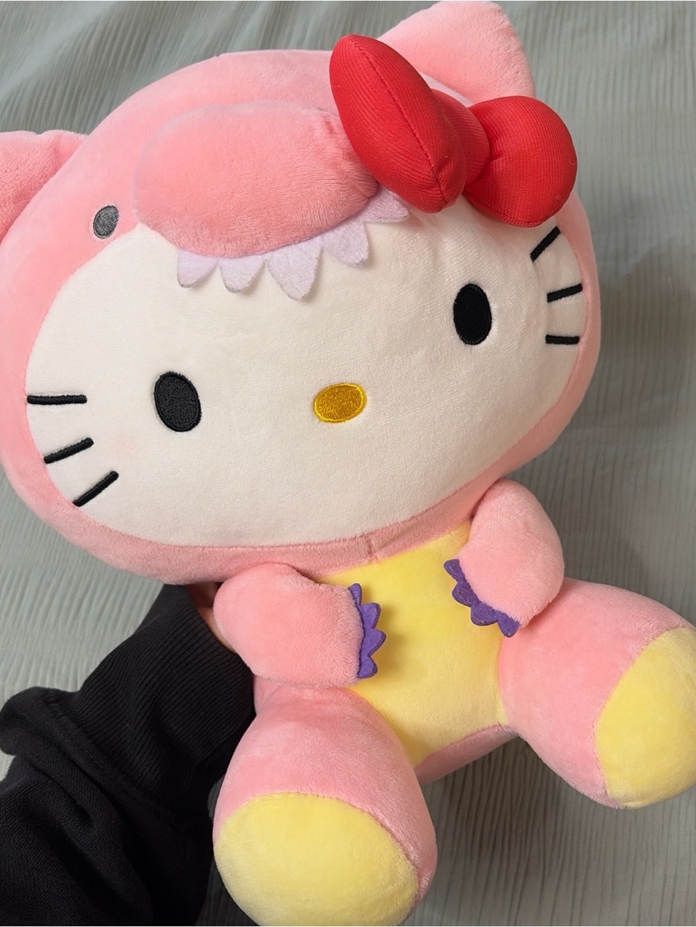 Hello Kitty Pink Dinosaur Suit Plush with Red Bow and Yellow Accents